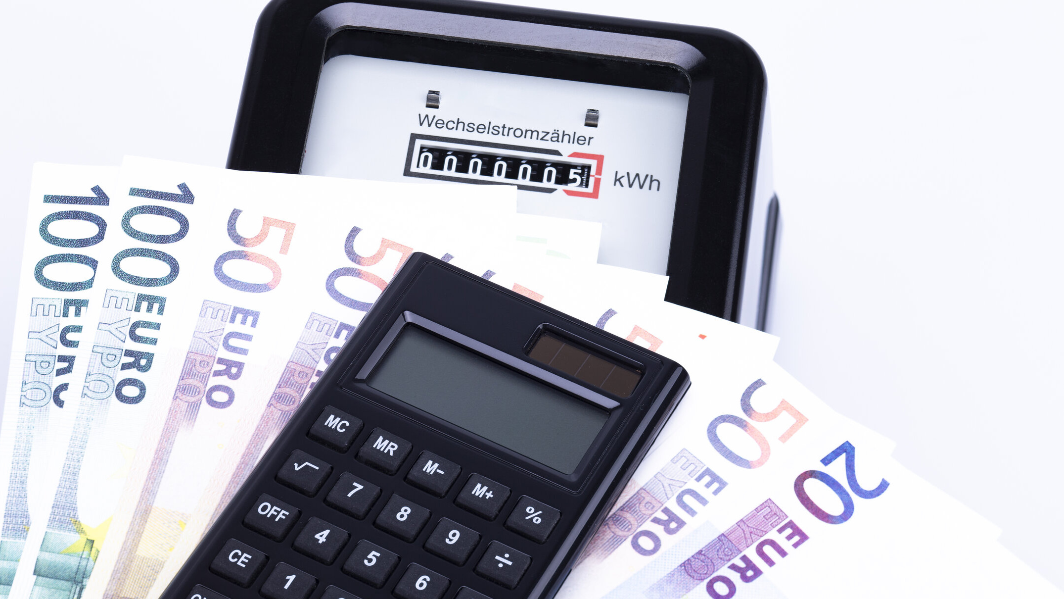 Abbildung Taschenrechner und Geldscheine